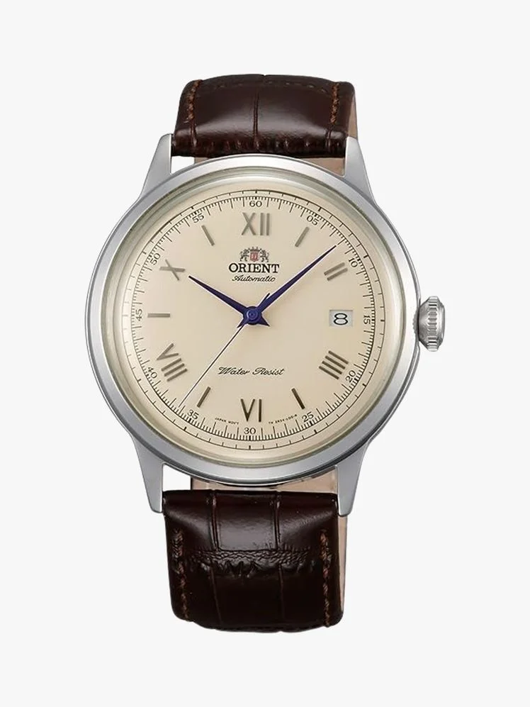 Image may contain: Wristwatch, Arm, Body Part, and Person