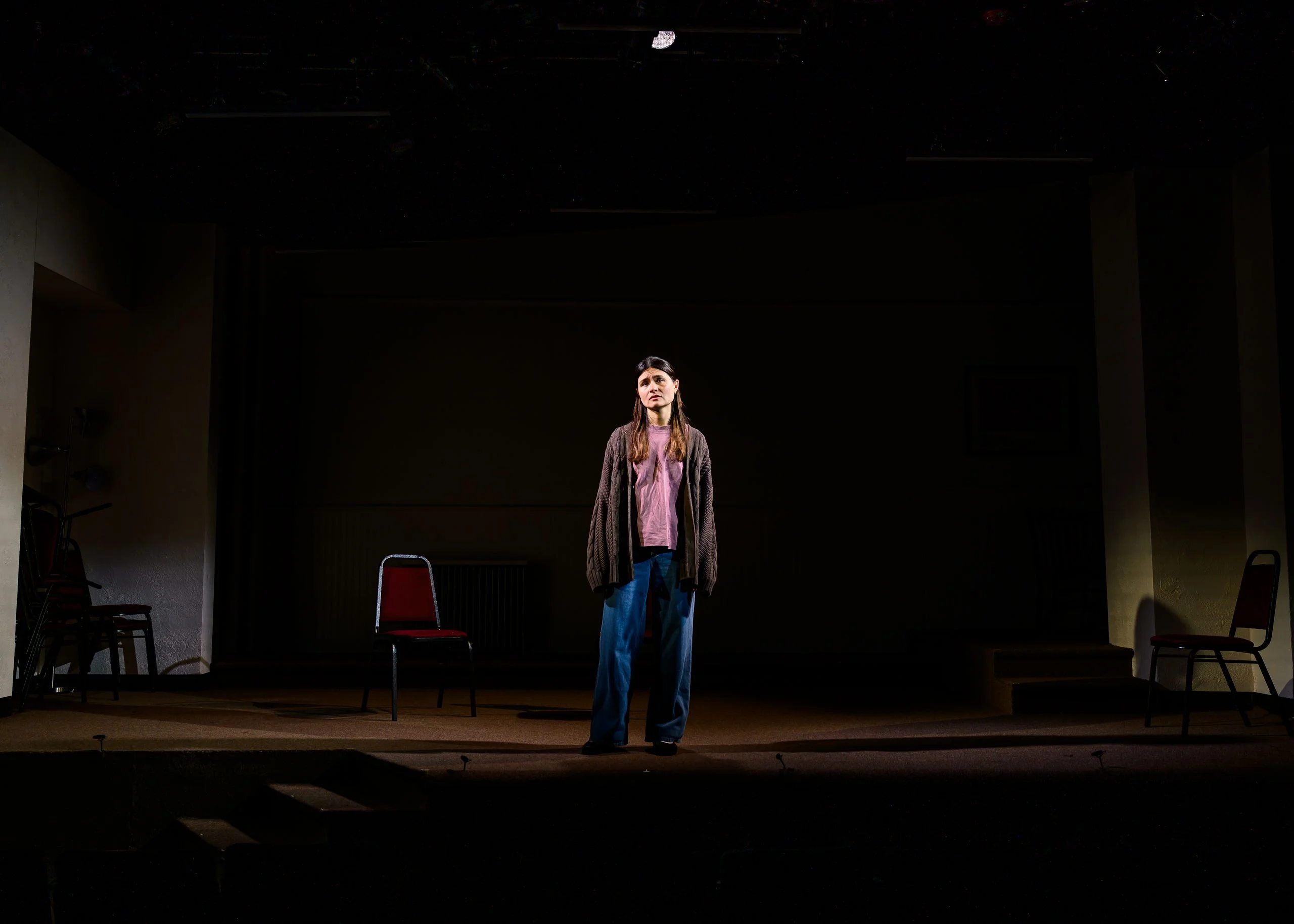 Image may contain Phillipa Soo Performer Person Solo Performance Chair Furniture Clothing Coat Pants and Standing