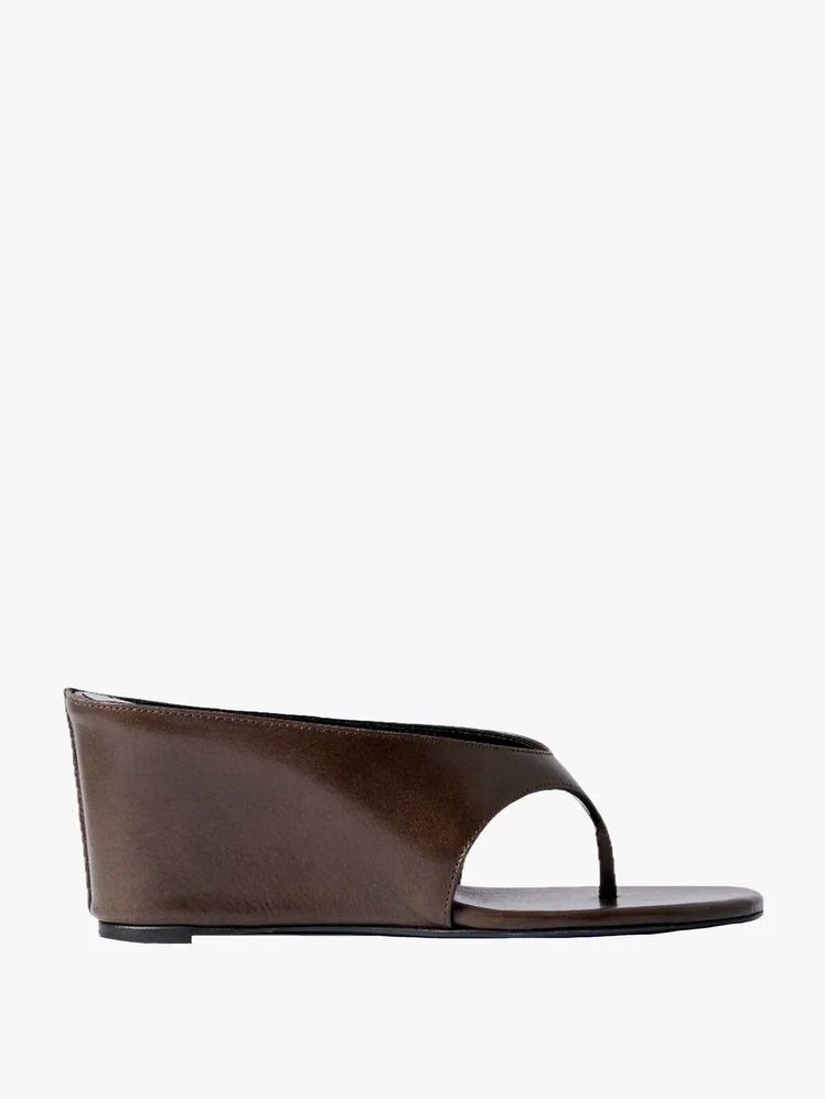 Image may contain: Clothing, Footwear, Sandal, and Accessories