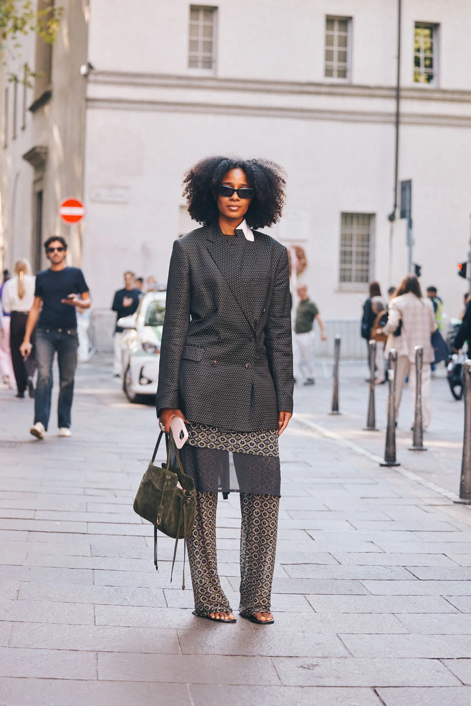 Image may contain Bill Bergey Bill Bergey Adult Person Pedestrian Clothing Coat Light Traffic Light and Accessories