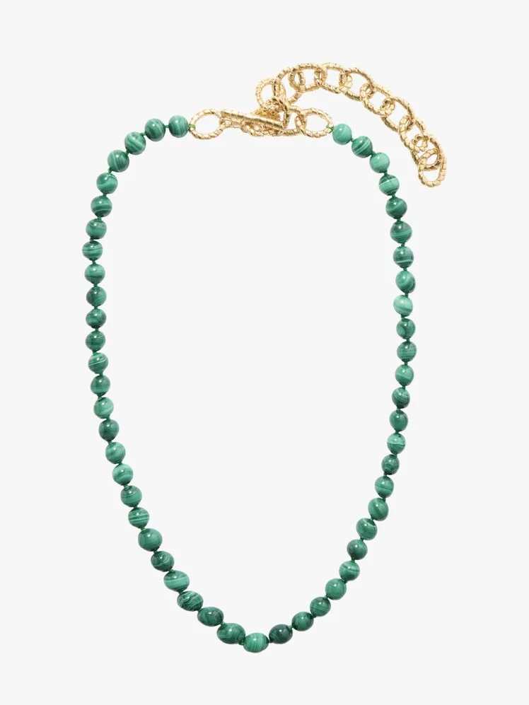 Image may contain: Accessories, Bead, Bead Necklace, Jewelry, Ornament, Necklace, Gemstone, Bracelet, and Turquoise