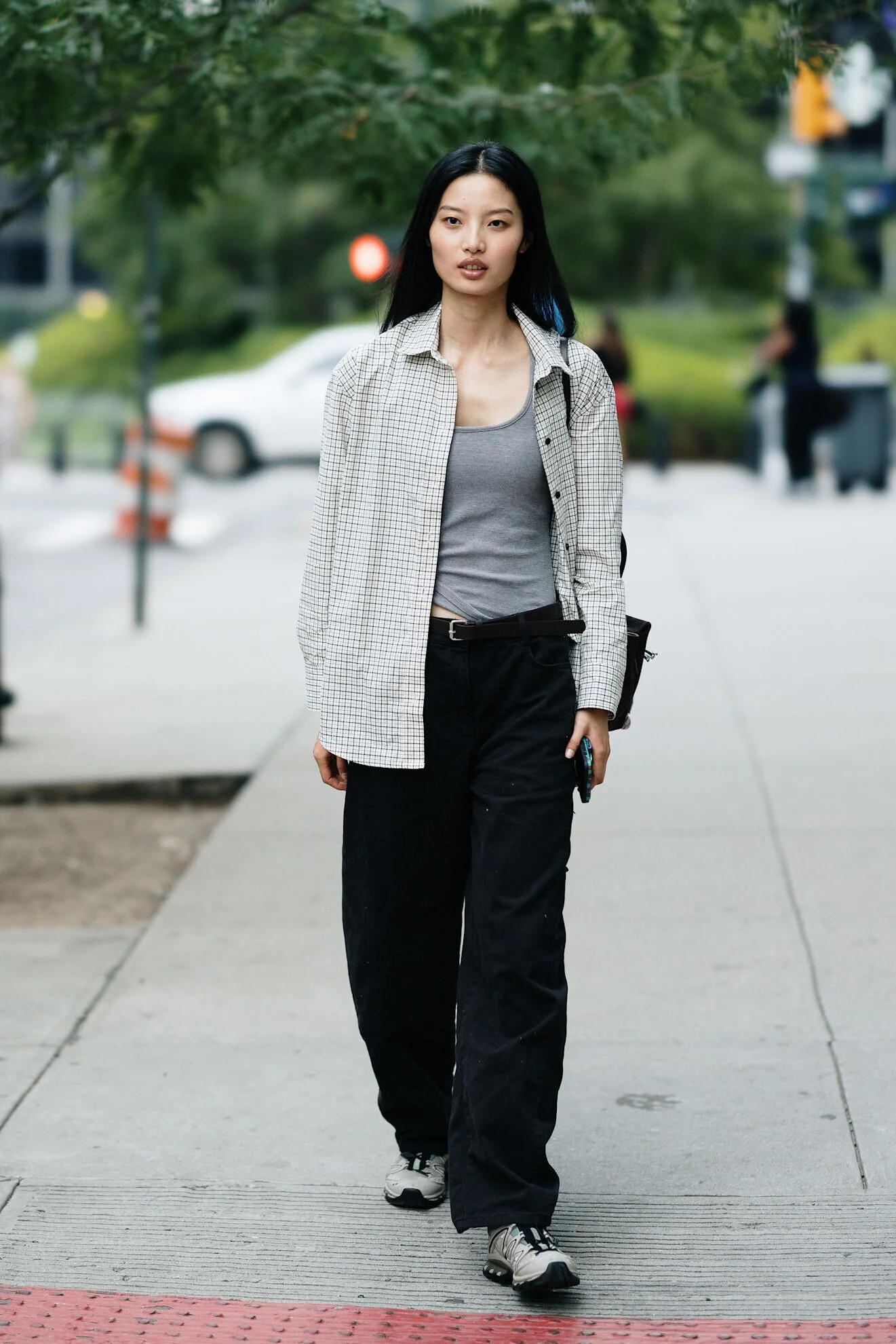 Image may contain Kim Sunghee Clothing Pants Black Hair Hair Person Standing Blazer Coat Jacket and Adult