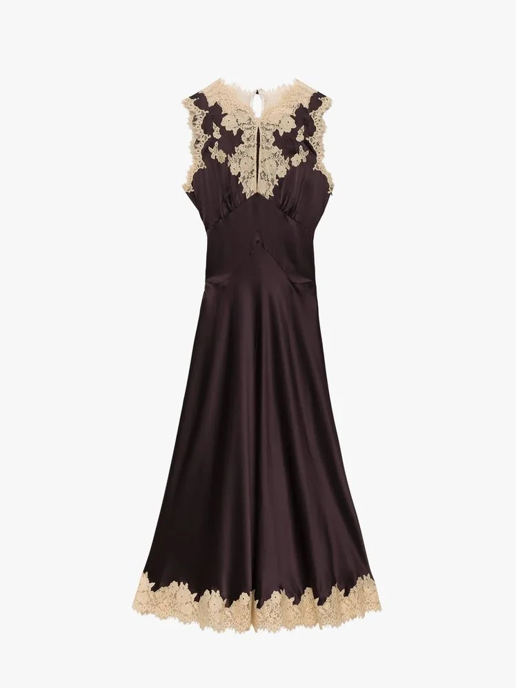 Image may contain: Clothing, Dress, Formal Wear, Evening Dress, Fashion, Gown, Wedding, Wedding Gown, and Robe
