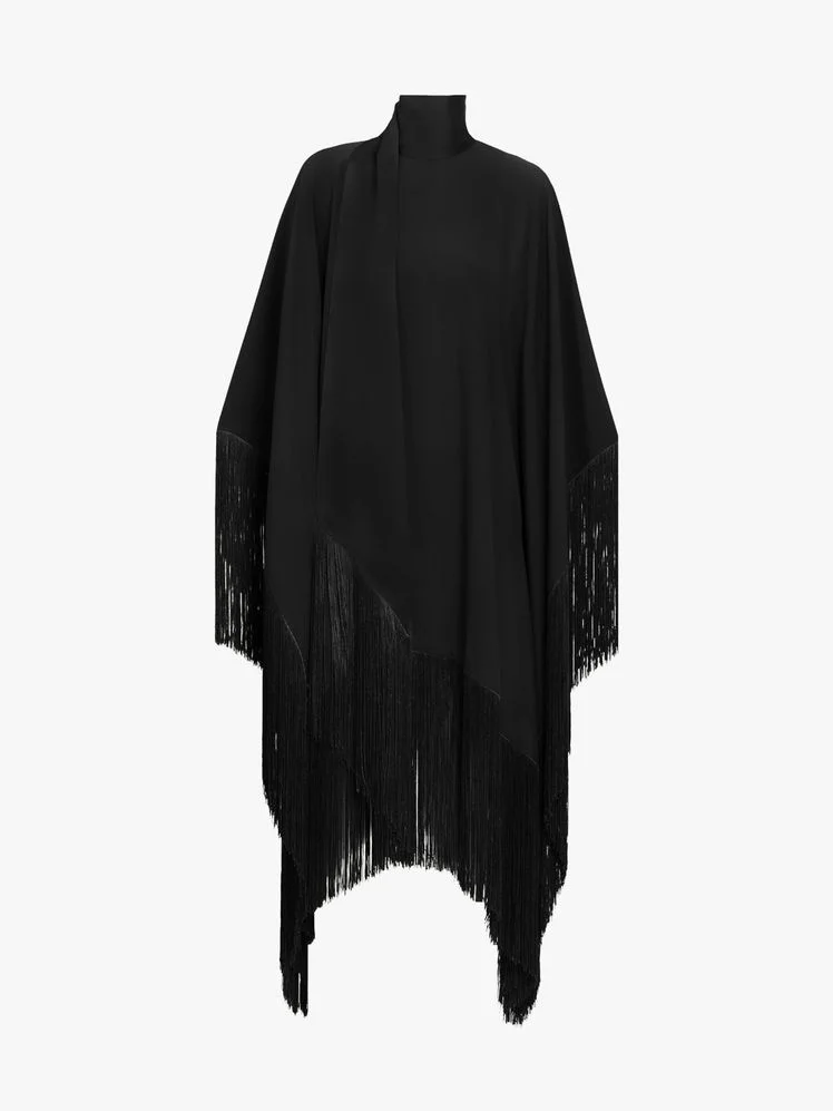 Image may contain: Fashion, Cloak, Clothing, Poncho, and Coat