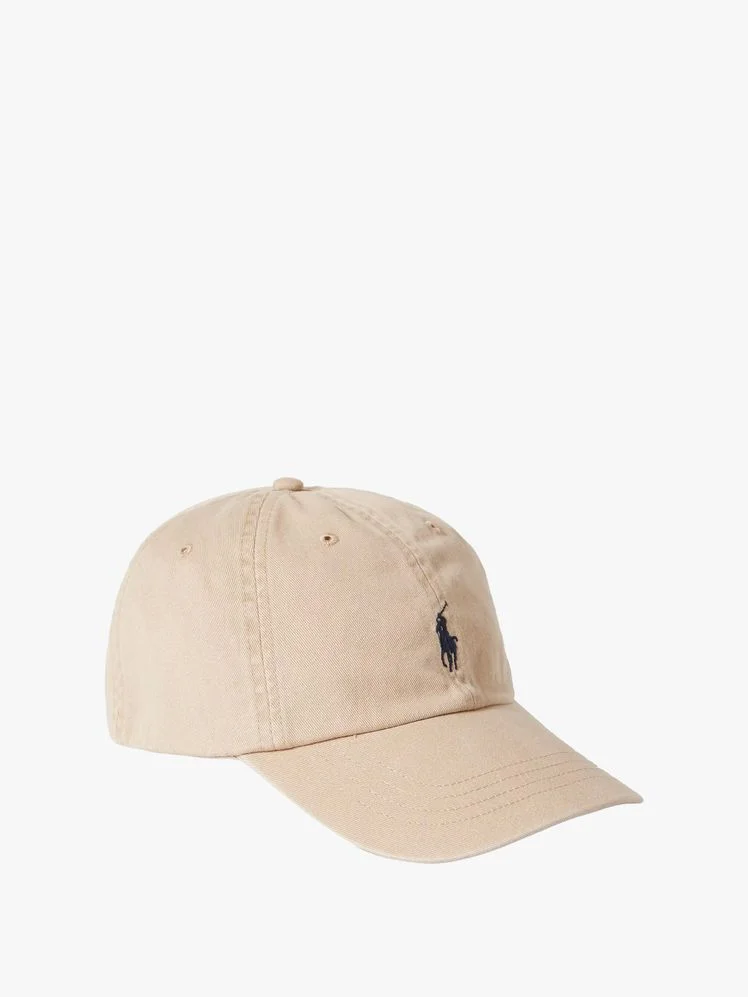 Image may contain: Baseball Cap, Cap, Clothing, and Hat