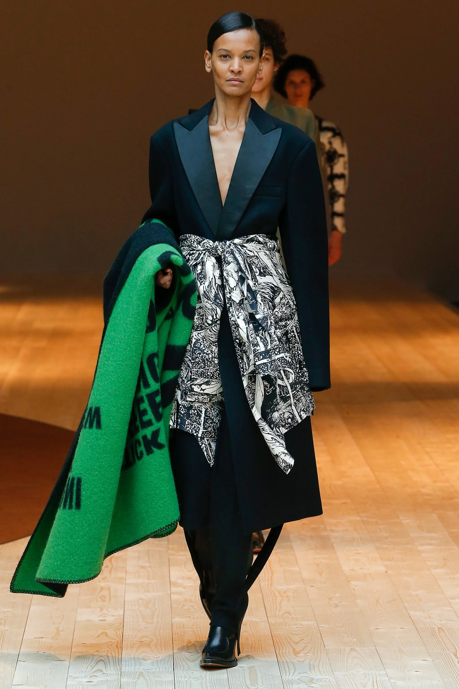 Image may contain Liya Kebede Clothing Apparel Fashion Human Person Robe Evening Dress Gown Runway and Long Sleeve