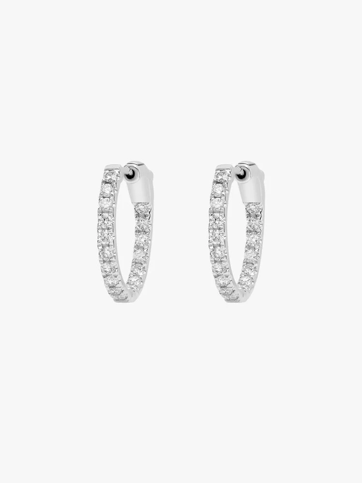 Image may contain: Accessories, Diamond, Gemstone, Jewelry, and Earring