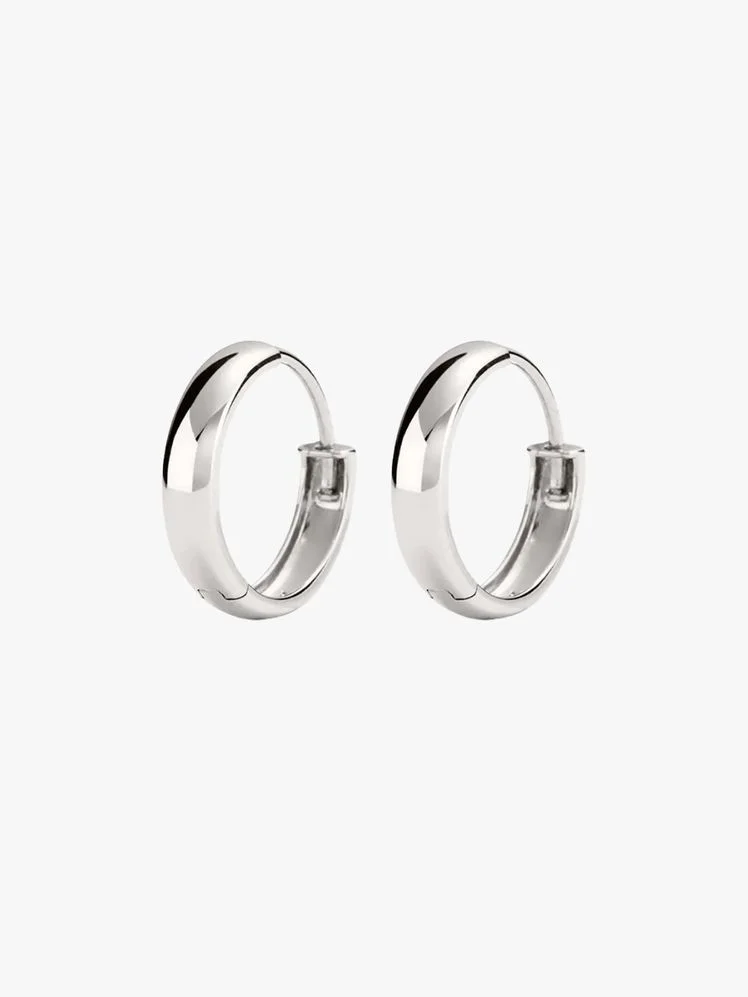 Image may contain: Accessories, Earring, Jewelry, Platinum, Silver, Diamond, Gemstone, Ring, and Smoke Pipe