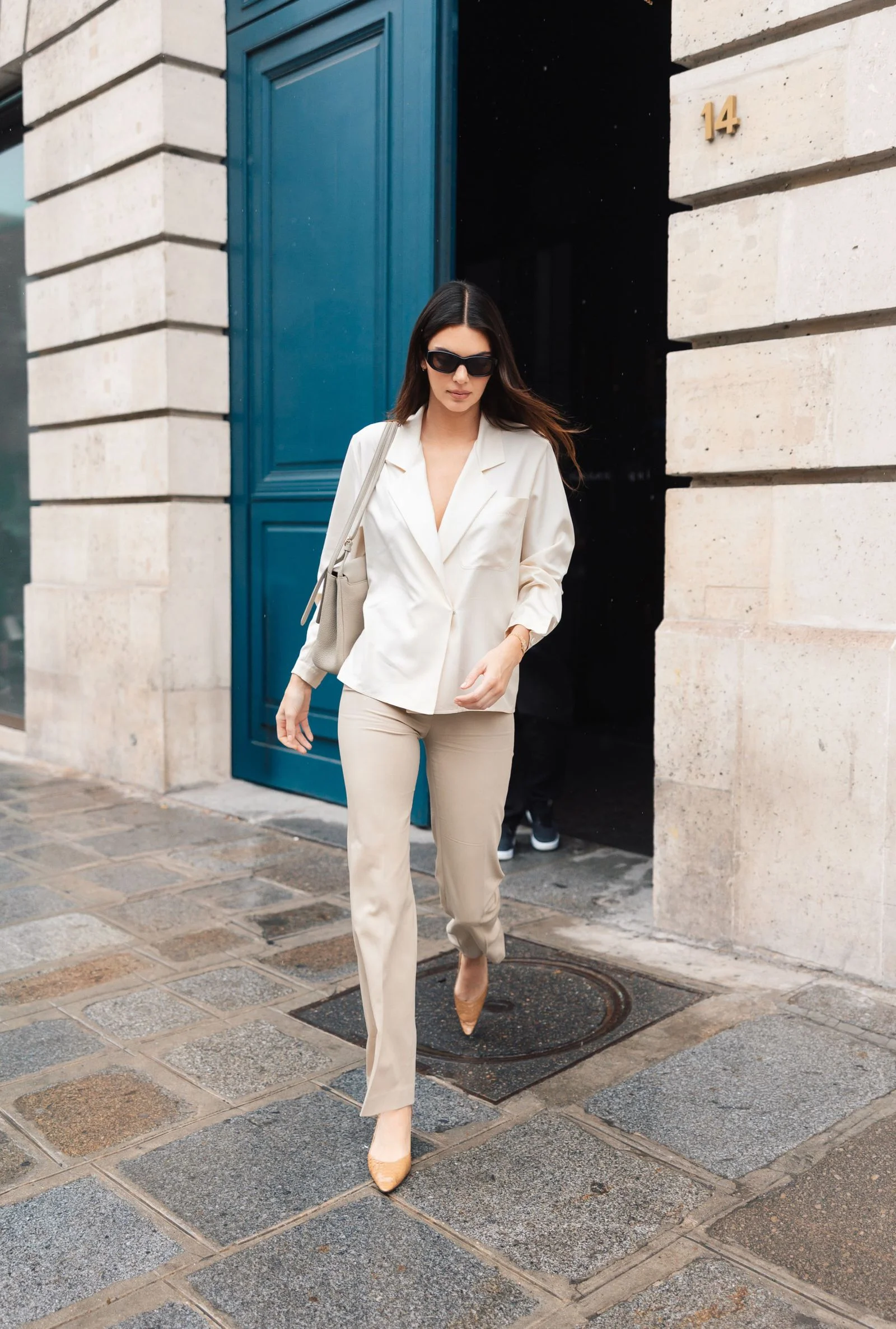 EXCLUSIVE Paris FRANCE Kendall Jenner leaves the LOreal popup in Paris during Fashion Week looking chic and stylish by...