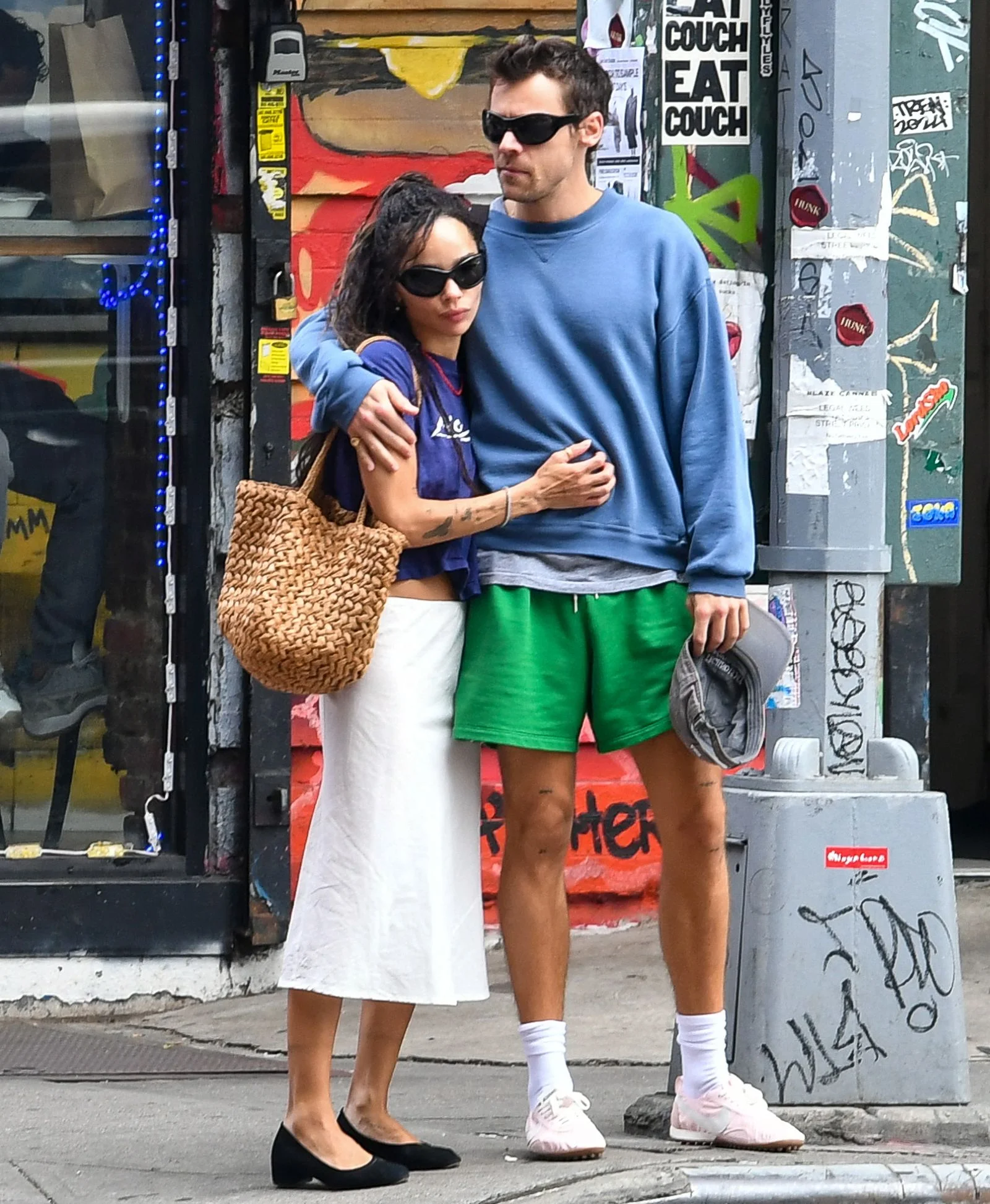 Image may contain Harry Styles Zoë Kravitz Clothing Shorts Adult Person Skirt Accessories Bag and Handbag
