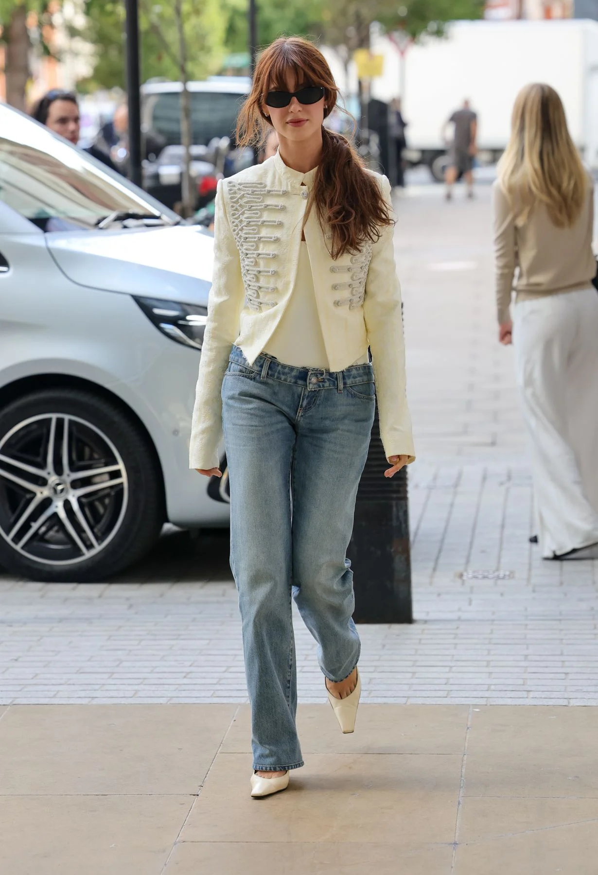 Image may contain Clothing Jeans Pants Adult Person and Coat