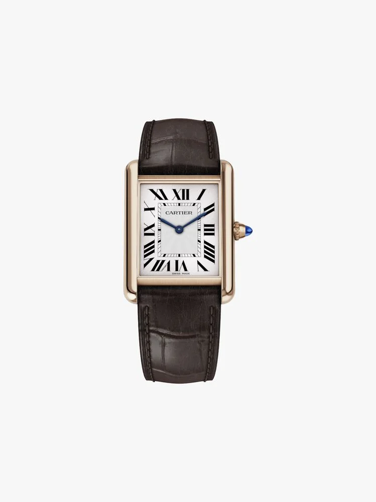 Image may contain: Wristwatch, Arm, Body Part, and Person