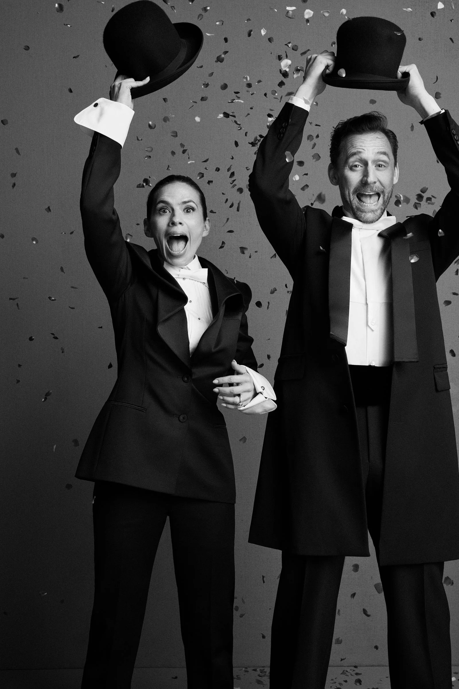 Image may contain Tom Hiddleston Hayley Atwell Clothing Formal Wear Suit Coat Tuxedo Photography Face and Head