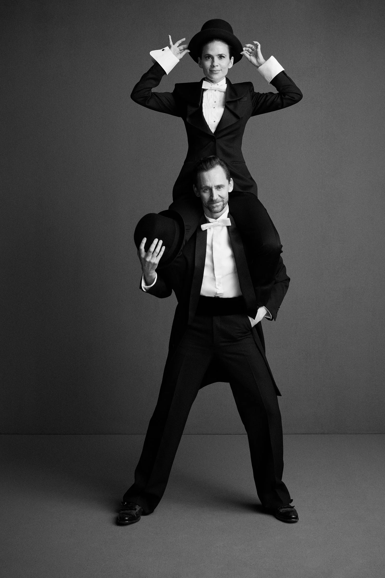 Image may contain Tom Hiddleston Hayley Atwell Clothing Formal Wear Suit Dancing Leisure Activities Person and Adult