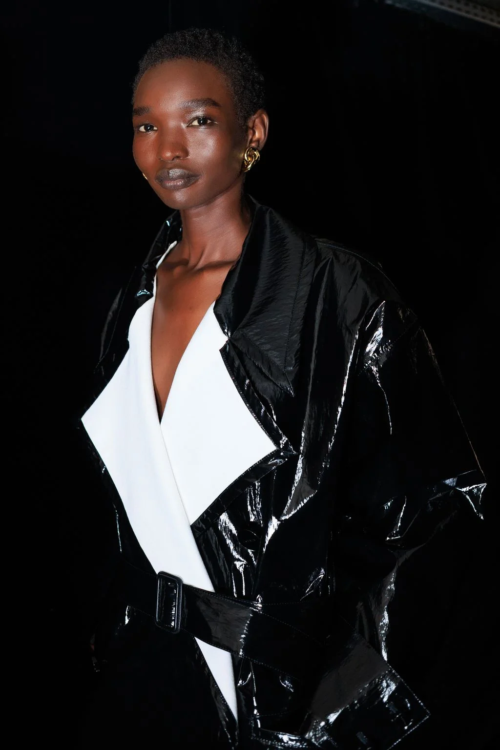Image may contain Clothing Coat Person Jacket Face Head Photography and Portrait