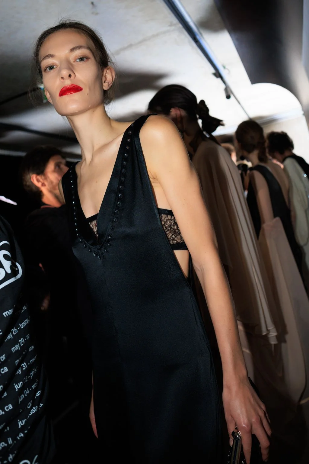 Image may contain Emily Loizeau Clothing Dress Adult Person Fashion Formal Wear Evening Dress Face and Head