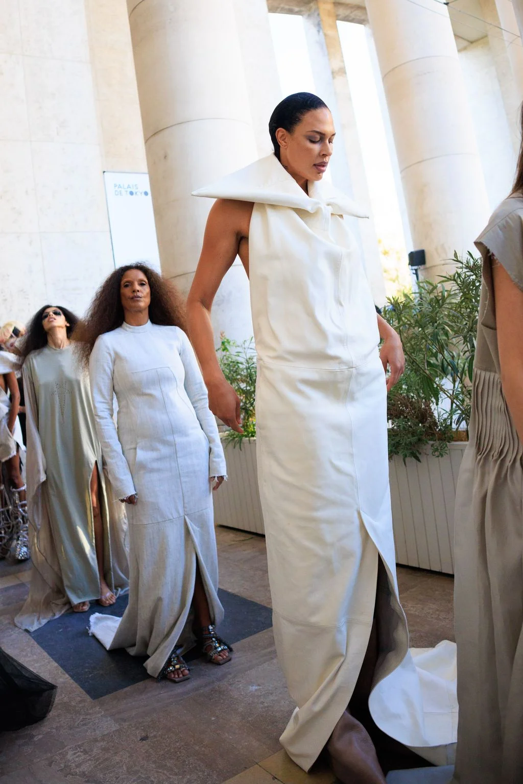 Image may contain Liz Cambage Clothing Dress Adult Person Fashion Formal Wear Sleeve Gown Wedding and Wedding Gown