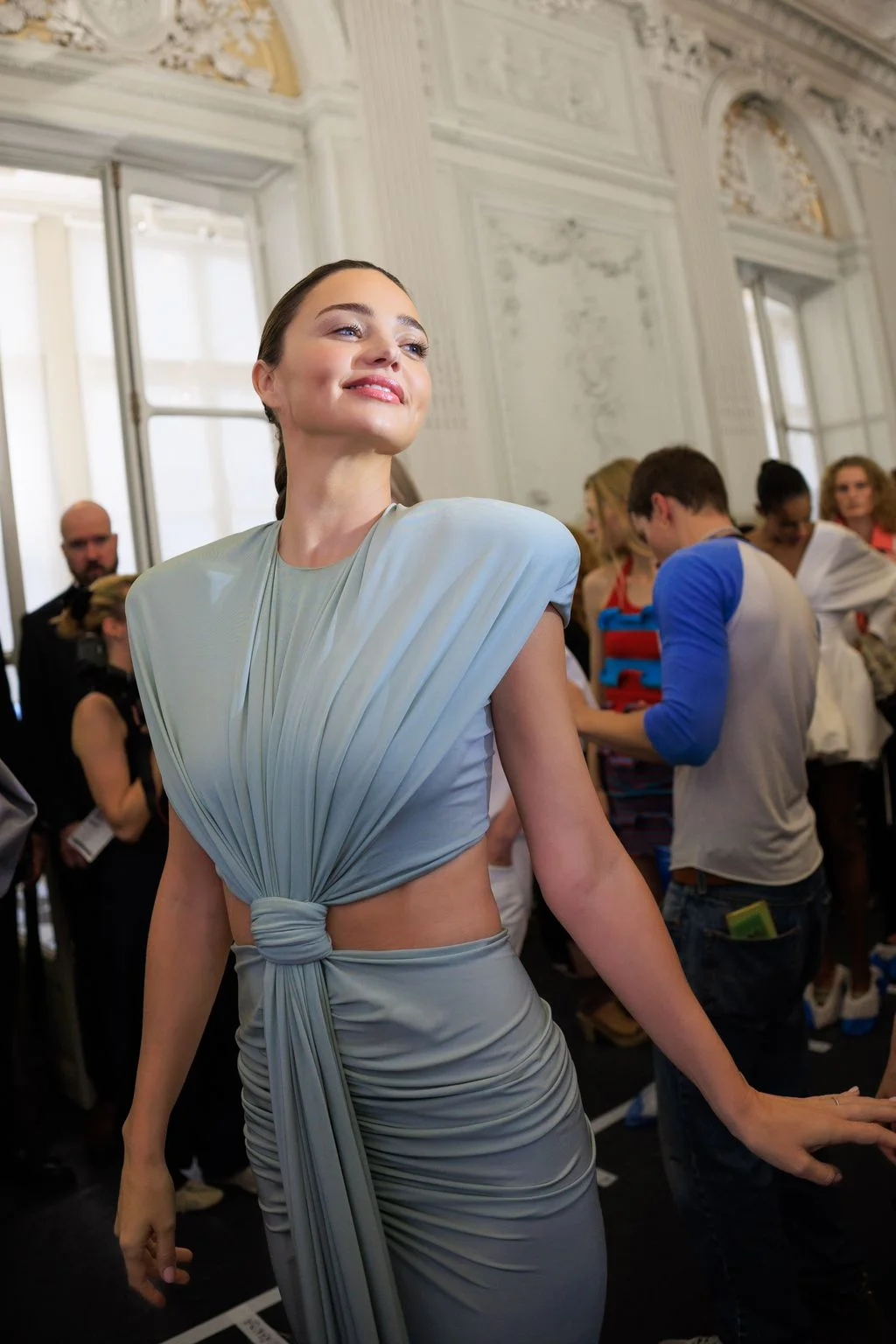 Image may contain Miranda Kerr Face Happy Head Person Smile Photobombing Adult Photography Portrait and Clothing