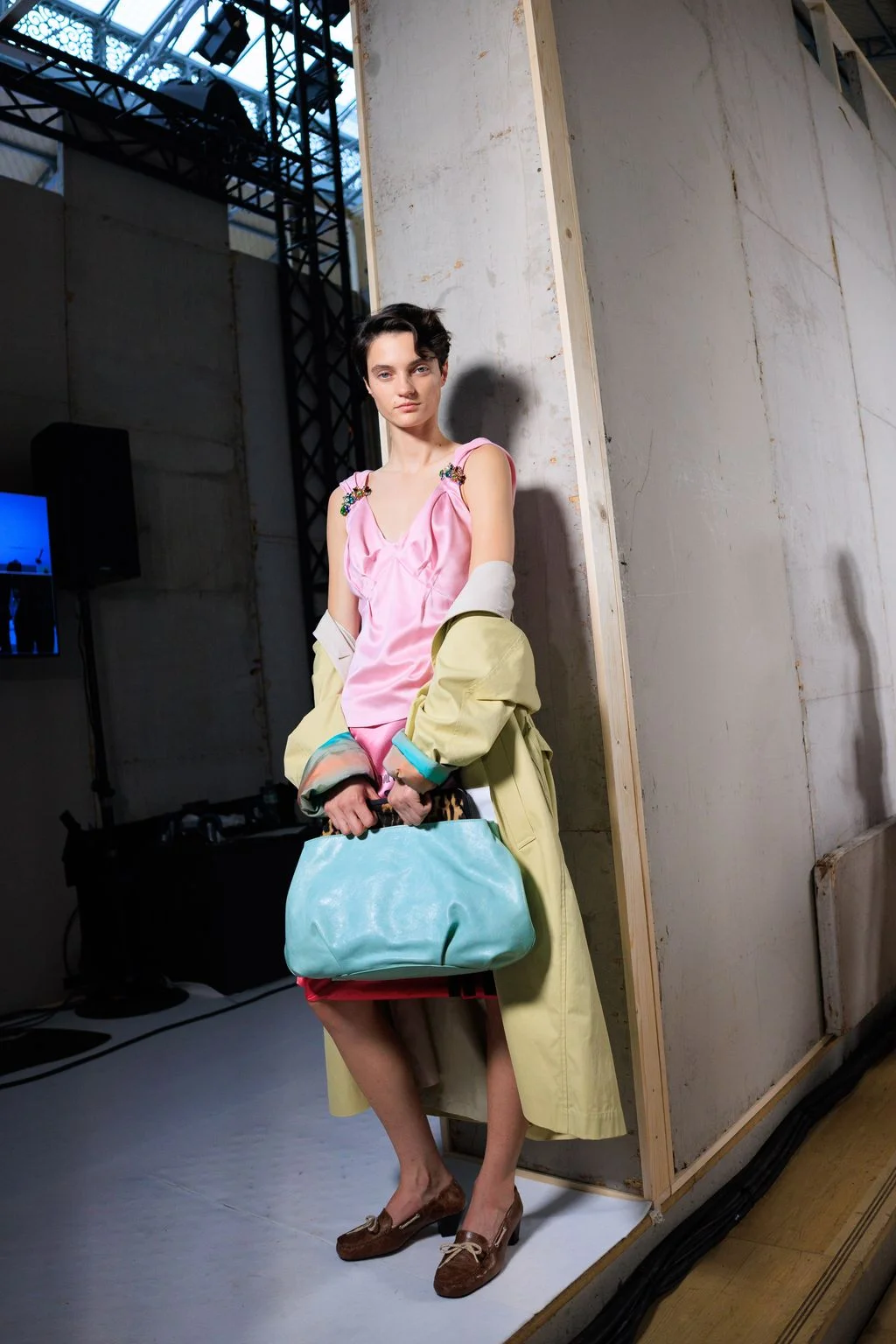 Image may contain Accessories Bag Handbag Person Purse Clothing Coat and Sleeve