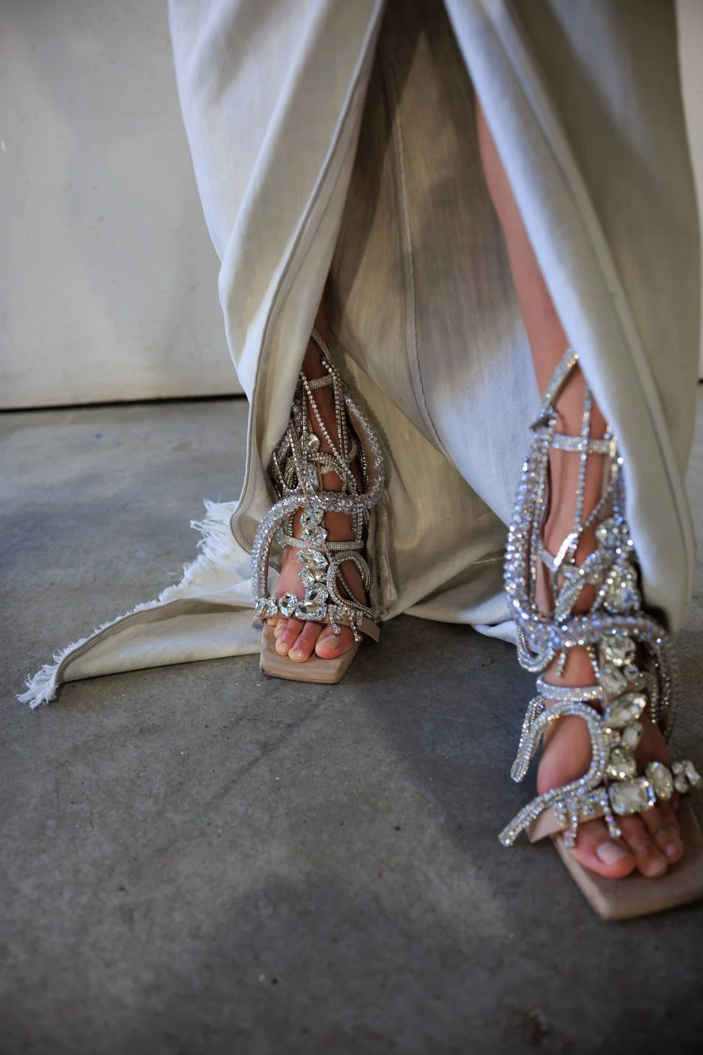 Image may contain Clothing Footwear Sandal Shoe High Heel Adult Person and Wedding