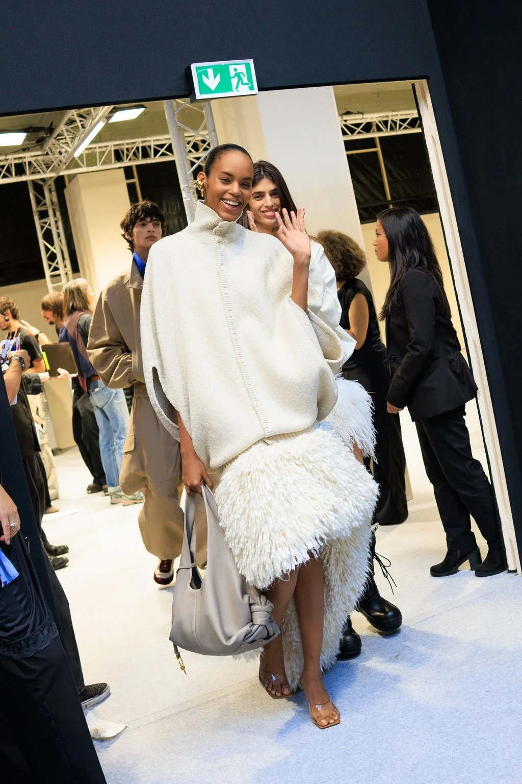 Image may contain Kerry Washington Niels Schneider Blazer Clothing Coat Jacket Adult Person Wedding and Fashion