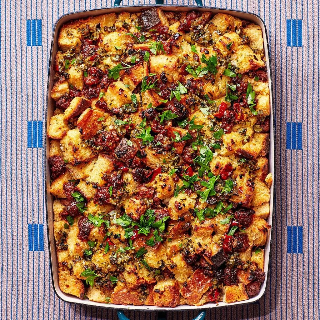 Chorizo and Calabrian chile stuffing in a rectangular baking dish