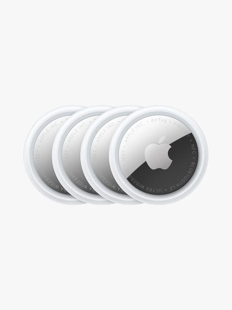 Airtags on a flat background.