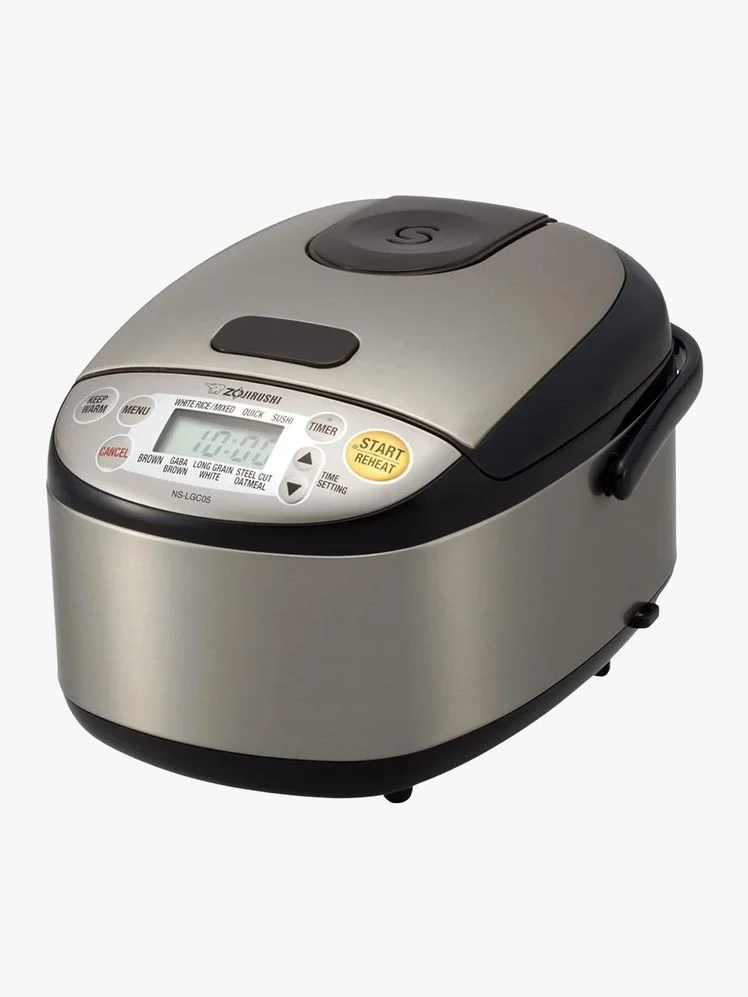 Rice cooker on a flat background.