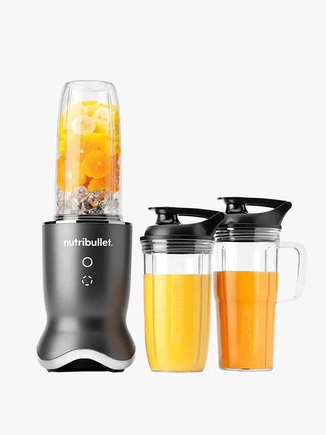 Image may contain: Device, Appliance, Electrical Device, Mixer, Blender, Bottle, and Shaker