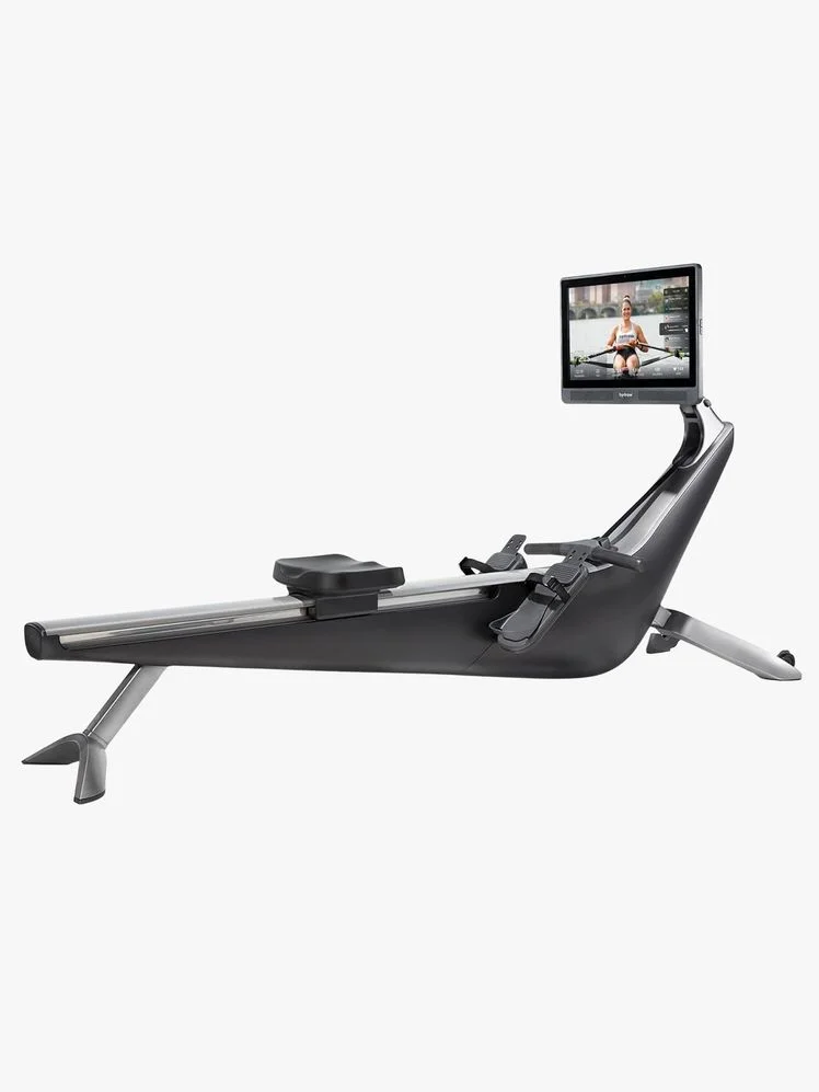 Image may contain: Computer Hardware, Electronics, Hardware, Monitor, Screen, Person, TV, Furniture, Table, Fitness, and Gym