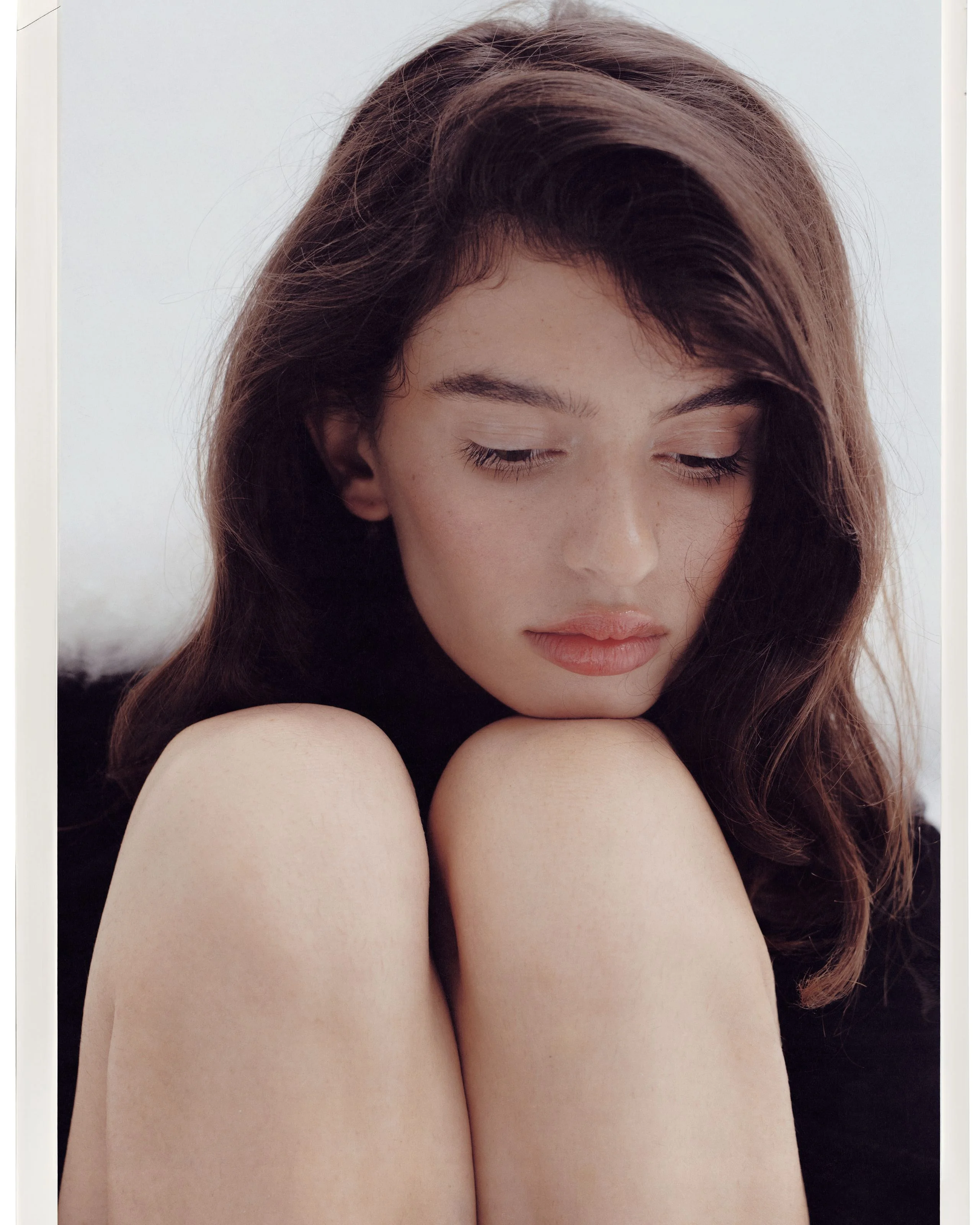 Image may contain Face Head Person Photography Portrait Adult and Sad
