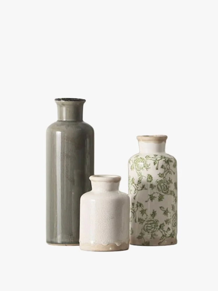 Image may contain: Pottery, Jar, Vase, Art, Porcelain, Bottle, and Shaker