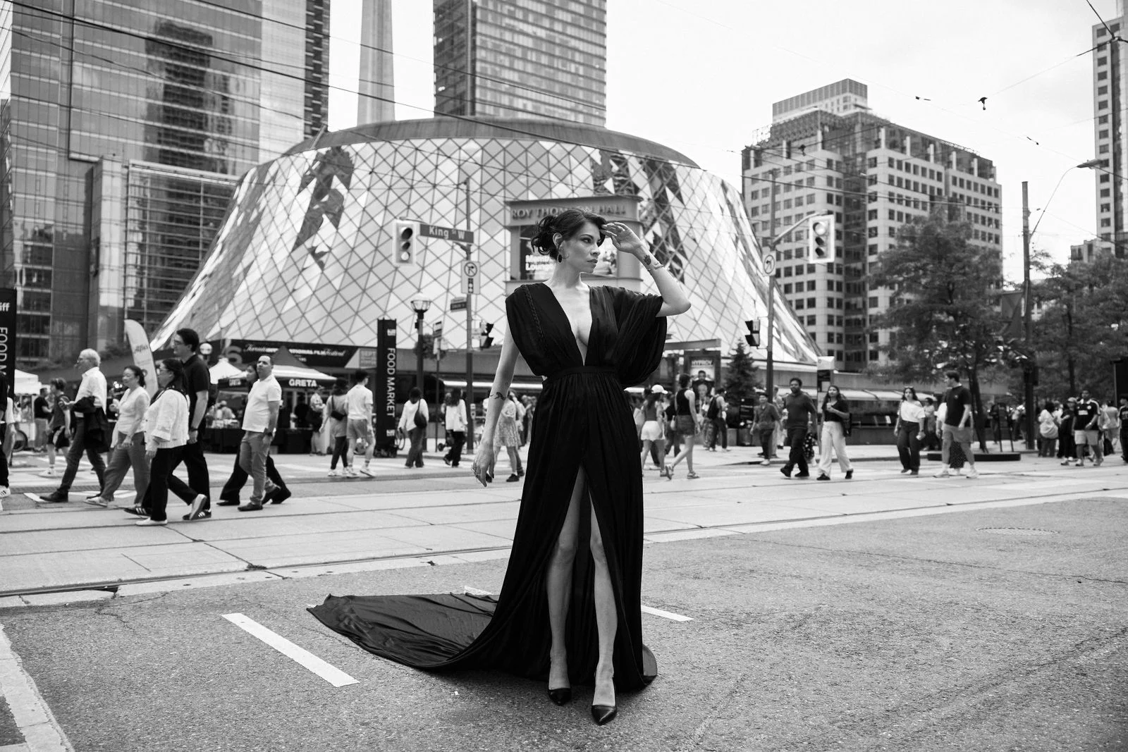 Image may contain Jonathan Cyprien Clothing Dress Formal Wear City Metropolis Urban Photography Adult and Person