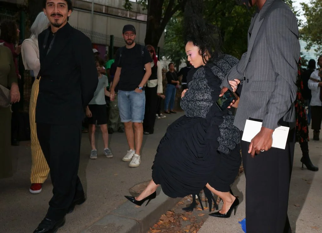 Image may contain Aliya Garayeva Adam LaRoche Clothing Footwear Shoe High Heel Pants Adult Person and Wristwatch