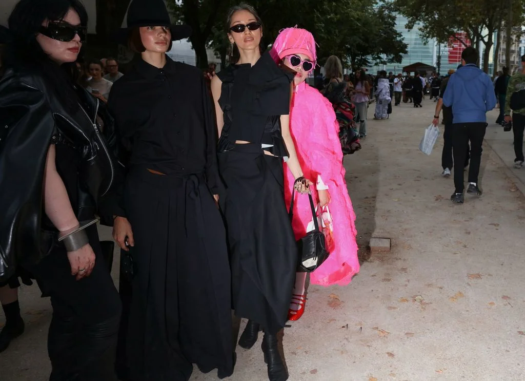 Image may contain Tom Mandrake Clothing Coat Adult Person Accessories Sunglasses Costume Fashion Dress and Face