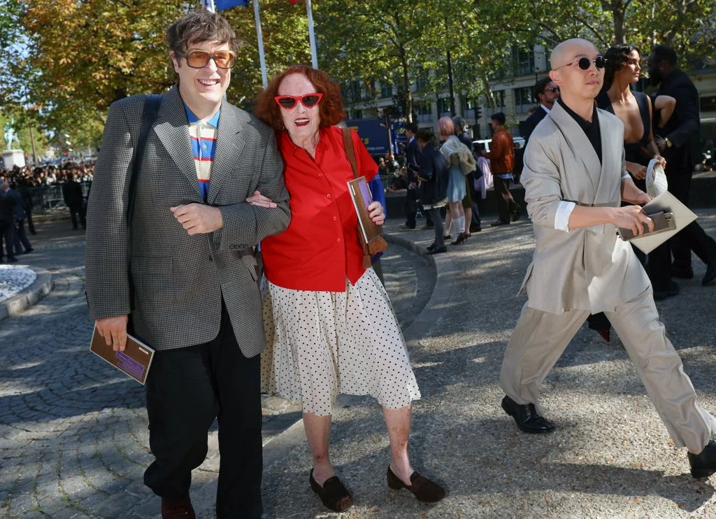 Image may contain Grace Coddington Clothing Skirt Coat Jacket Face Head Person Photography Portrait and Blazer