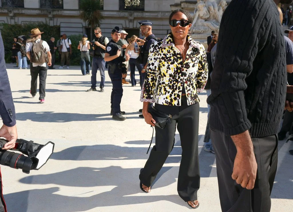 Image may contain Sanya RichardsRoss Person Walking Clothing Pants Adult Pedestrian People and Accessories