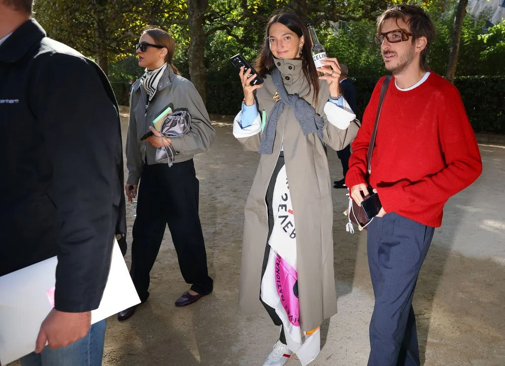 Image may contain Clothing Coat Accessories Bag Handbag Person Adult and Overcoat