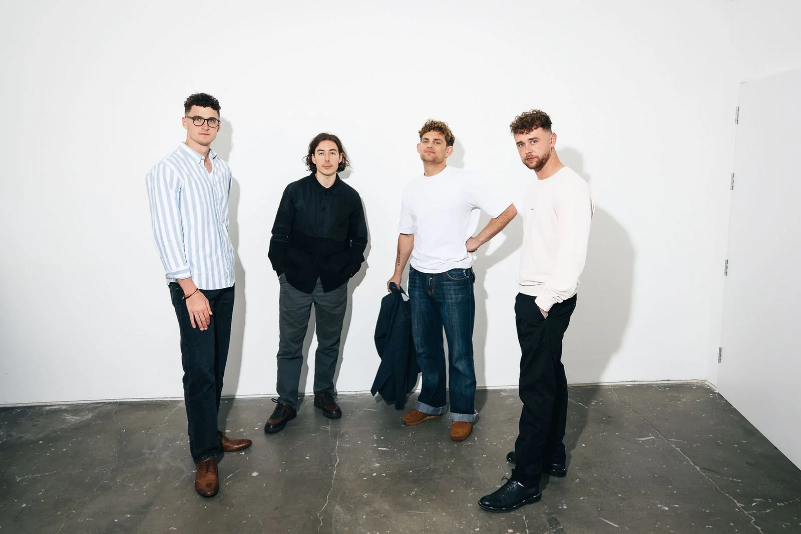 Image may contain Scott Neal Groupshot Person Clothing Pants Adult Footwear Shoe Teen People and Accessories