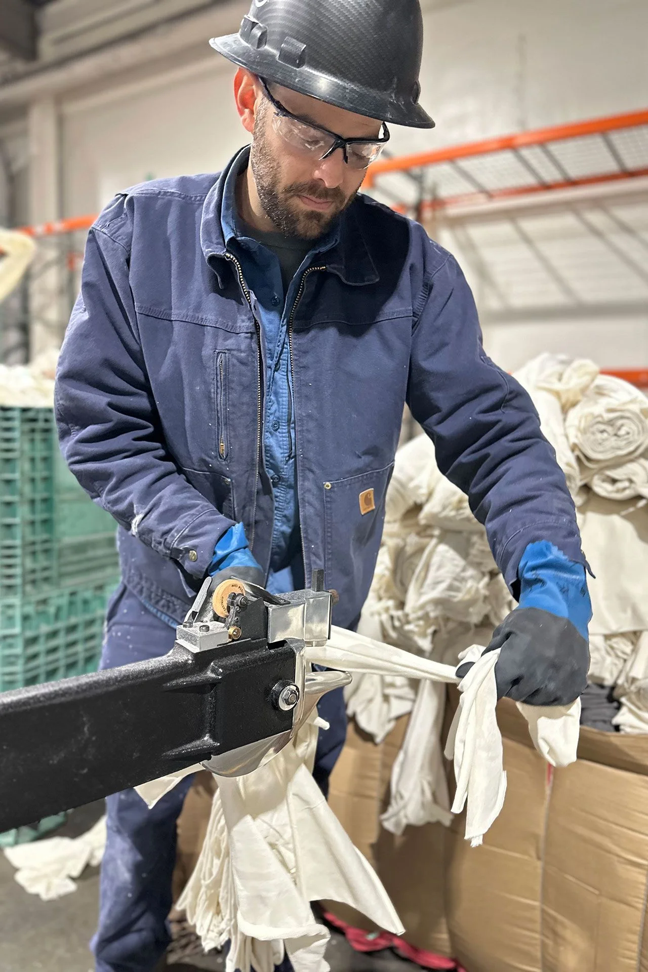 Image may contain Person Worker Helmet Clothing Glove Accessories Glasses and Adult