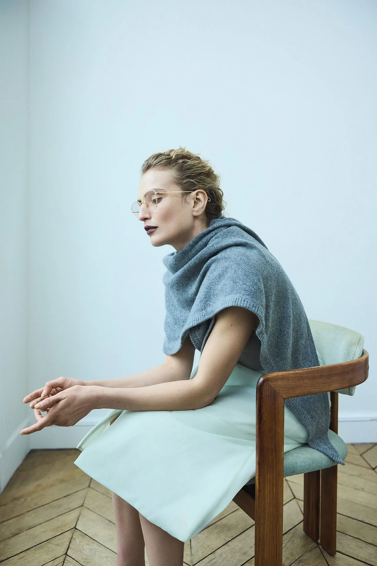 Image may contain Person Sitting Head Face Chair Furniture Photography and Portrait
