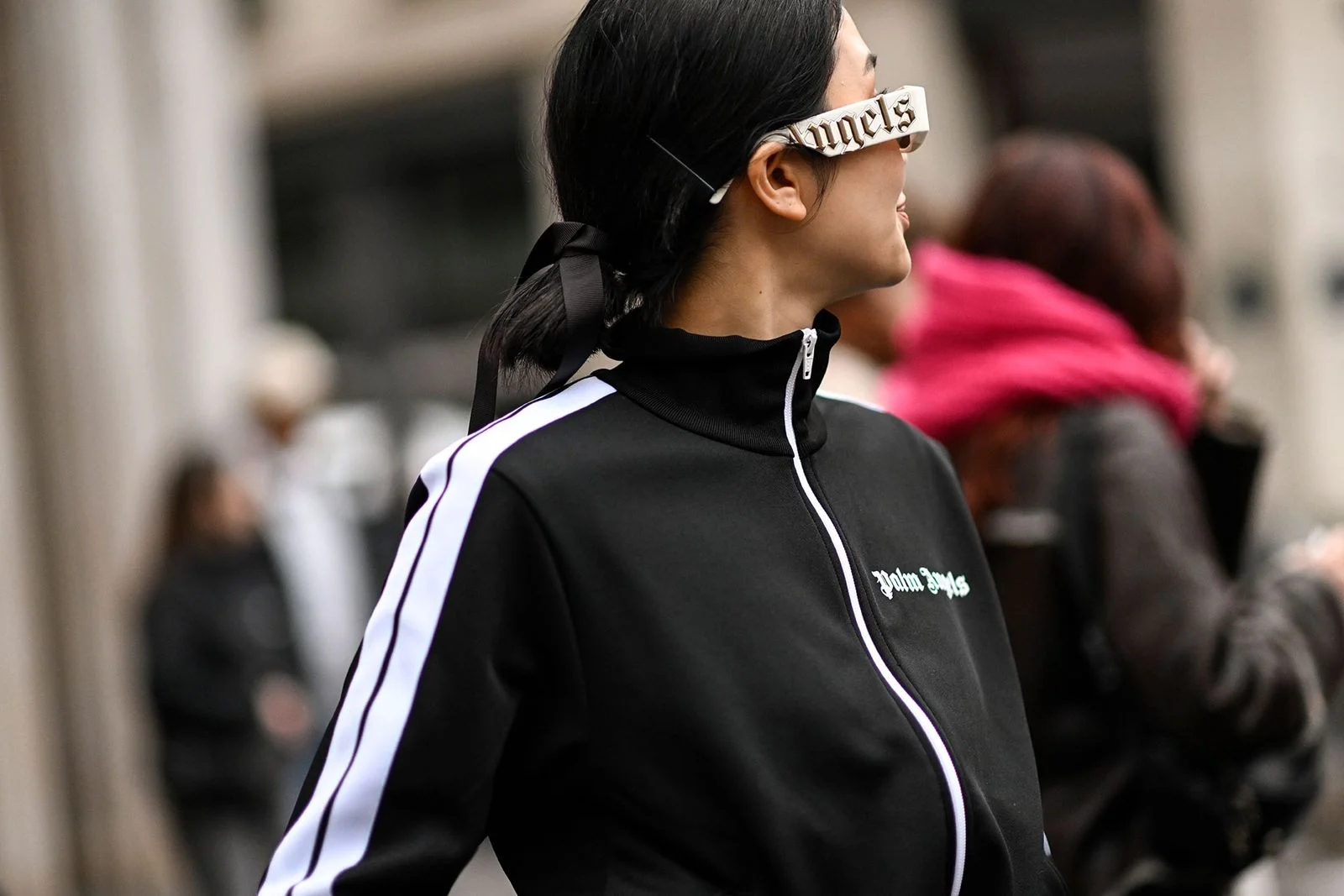 Image may contain Clothing Coat Jacket Black Hair Hair Person Adult Accessories Sunglasses Glasses Face and Head