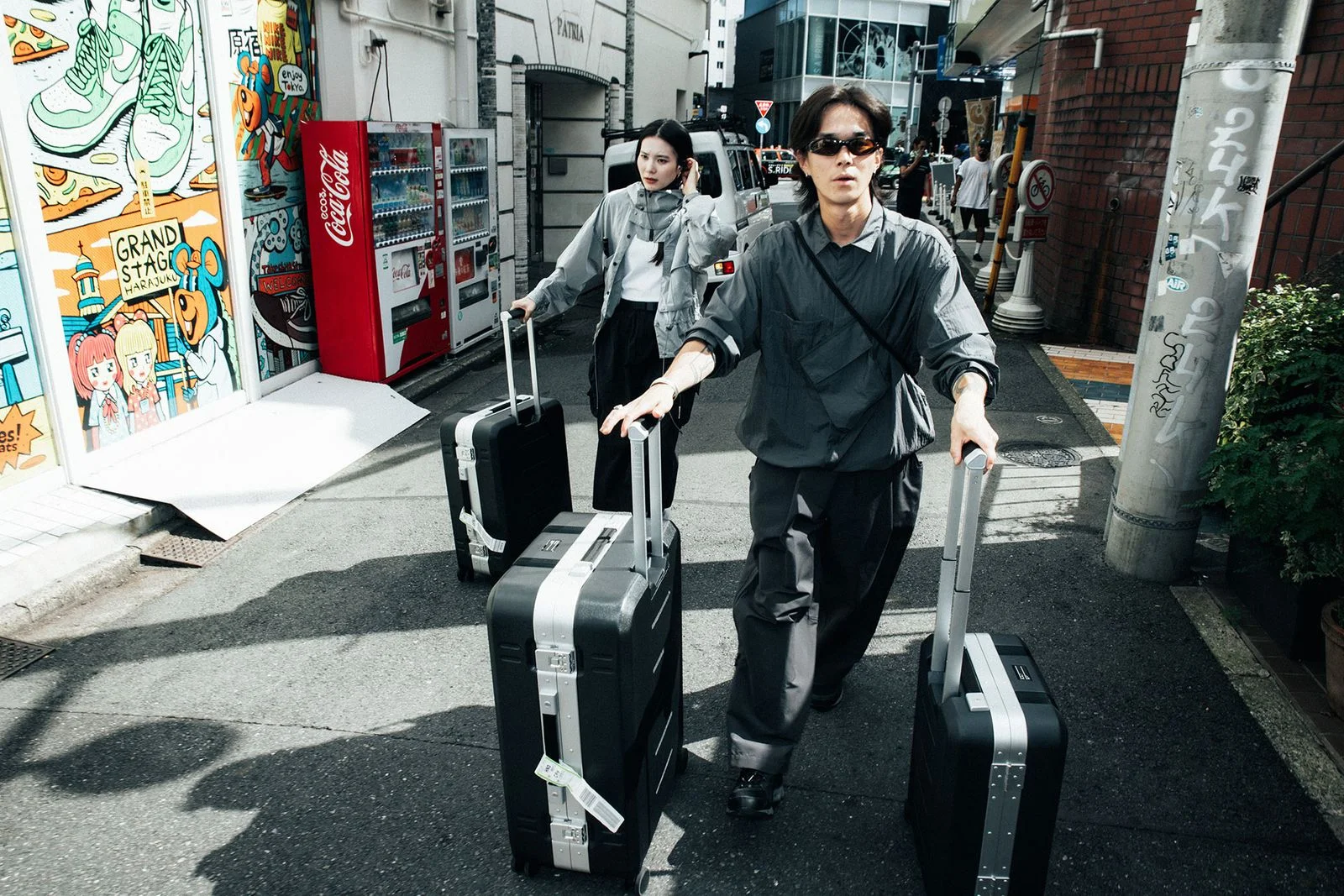 Image may contain Tommy Kono He Zi Adult Person Clothing Footwear Shoe Accessories Glasses Baggage and Bag