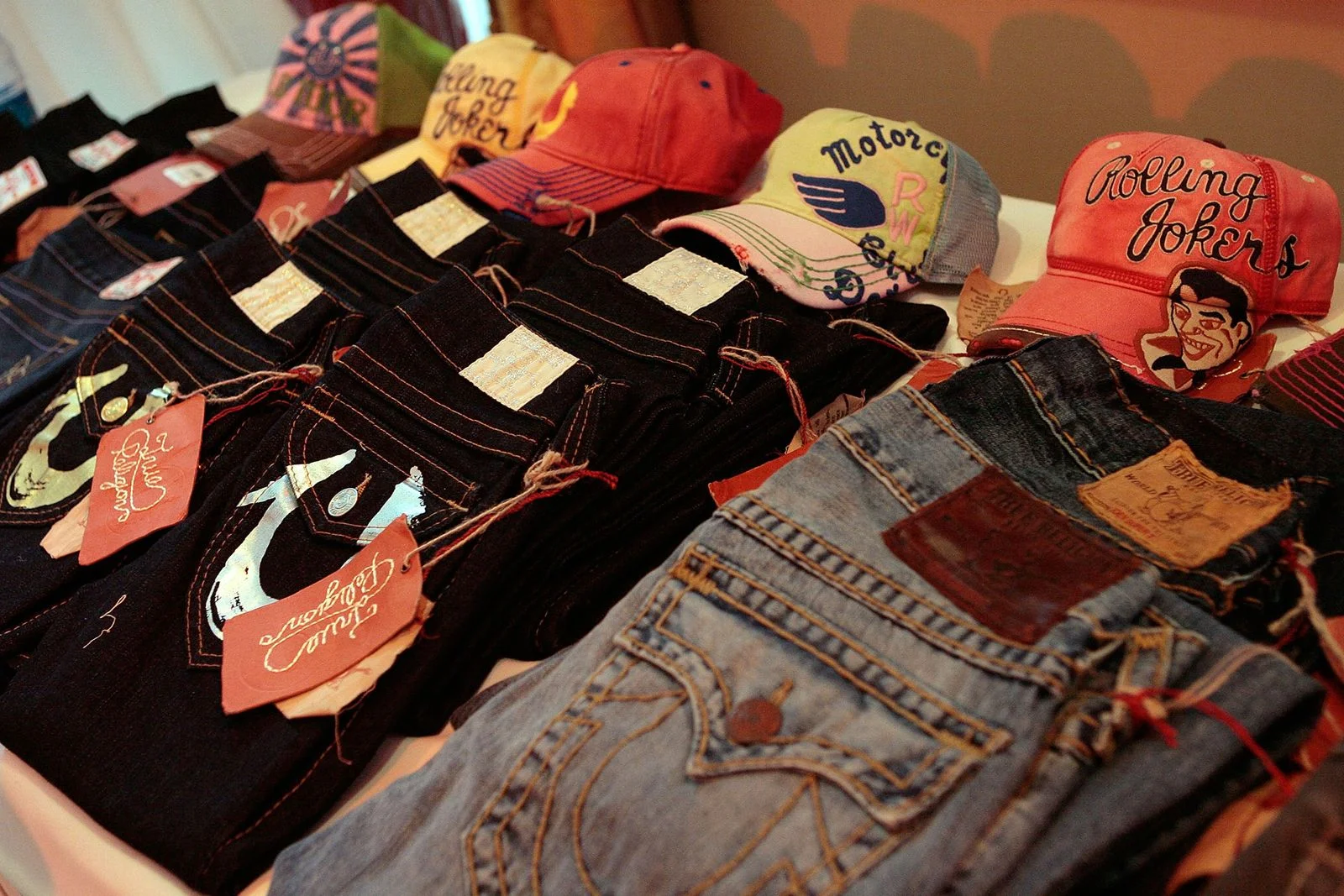 Image may contain Baseball Cap Cap Clothing Hat Pants Jeans Glove Baseball Baseball Glove Sport Adult and Person