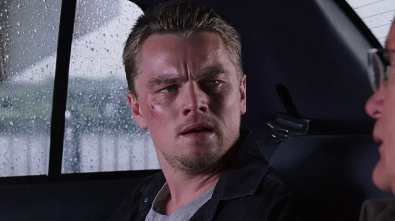 Costigan looking angry in a car in The Departed