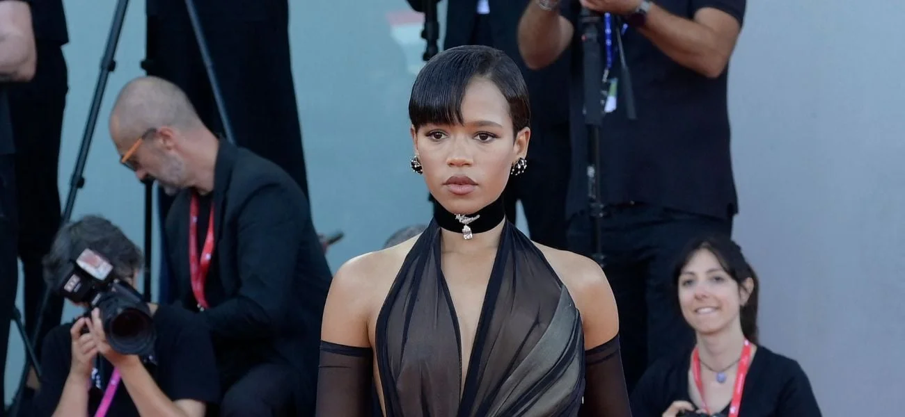 Taylor Russell Makes an Impression in Bold Black Slit Dress at Cannes